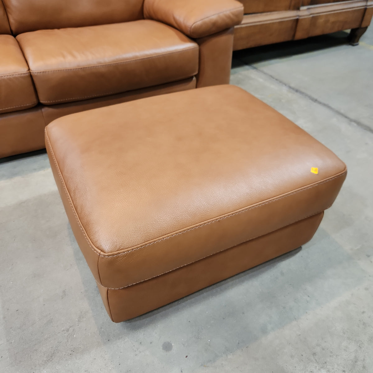 Natuzzi leather store ottoman