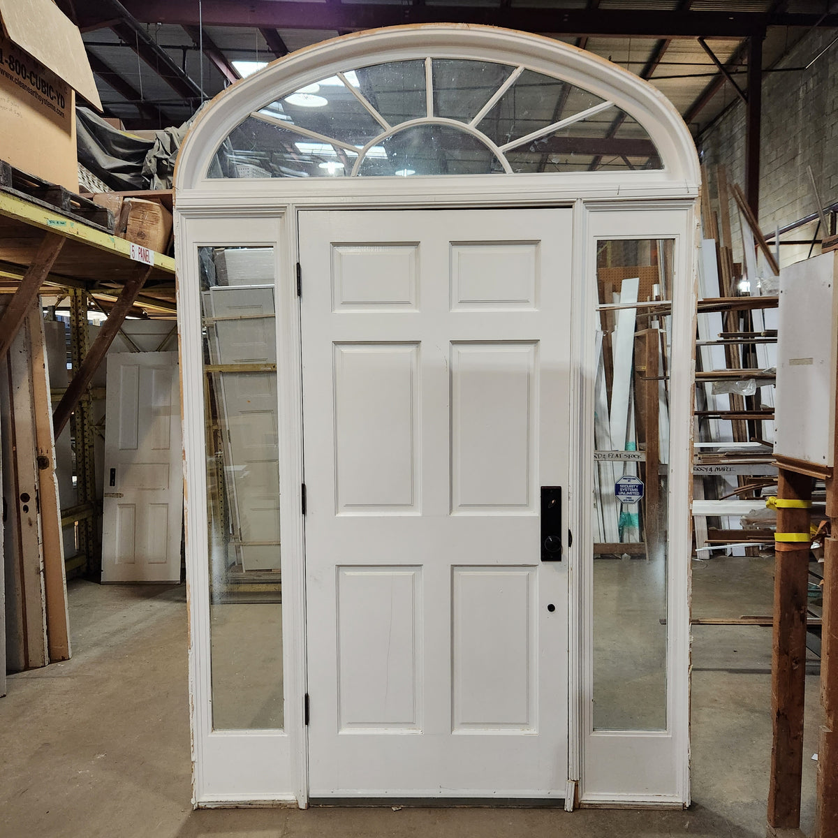 Oval Glass Doors with Arched Transom Window