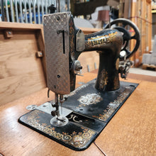 Load image into Gallery viewer, 1899 Singer 27 Sewing Machine and Refinished Oak Cabinet
