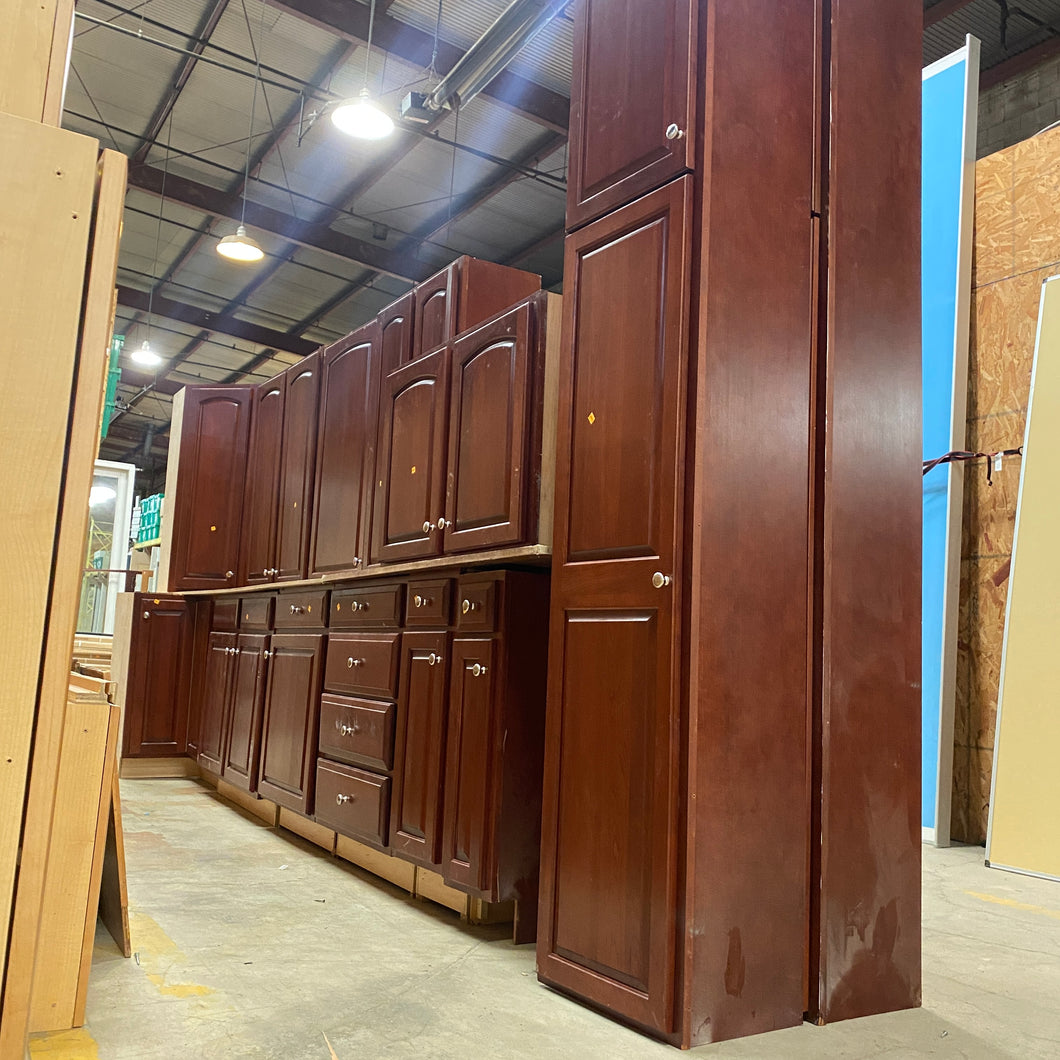 13 Piece Set of Cherry Stained Kitchen Cabinets by Yorktowne Cabinetry