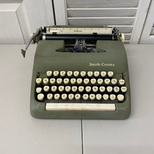 Load image into Gallery viewer, 1961 Vintage Smith Corona Olive Green Sterling Typewriter with Hard Case
