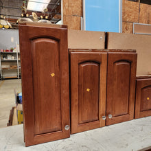 Load image into Gallery viewer, 8 Piece Set of Arched Panel Kitchen Cabinets by Custom Wood Products
