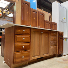 Load image into Gallery viewer, 8 Piece Set of Arched Panel Kitchen Cabinets by Custom Wood Products
