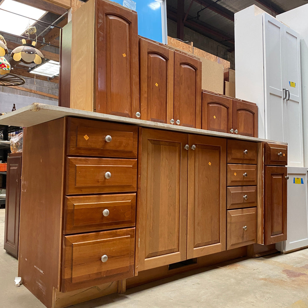 8 Piece Set of Arched Panel Kitchen Cabinets by Custom Wood Products